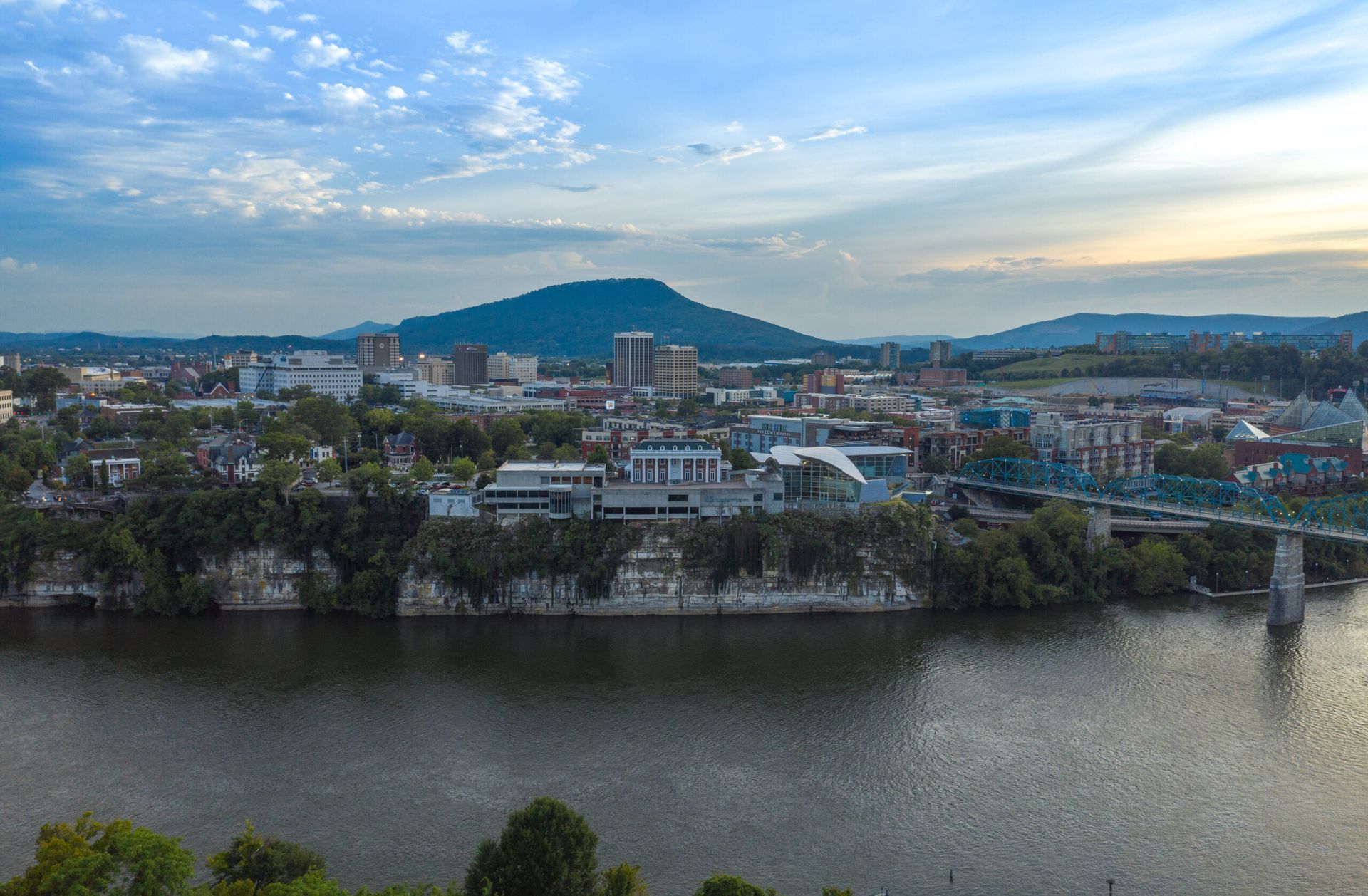Aerial view of the Chattanooga skyline along the Tennessee River at sunset