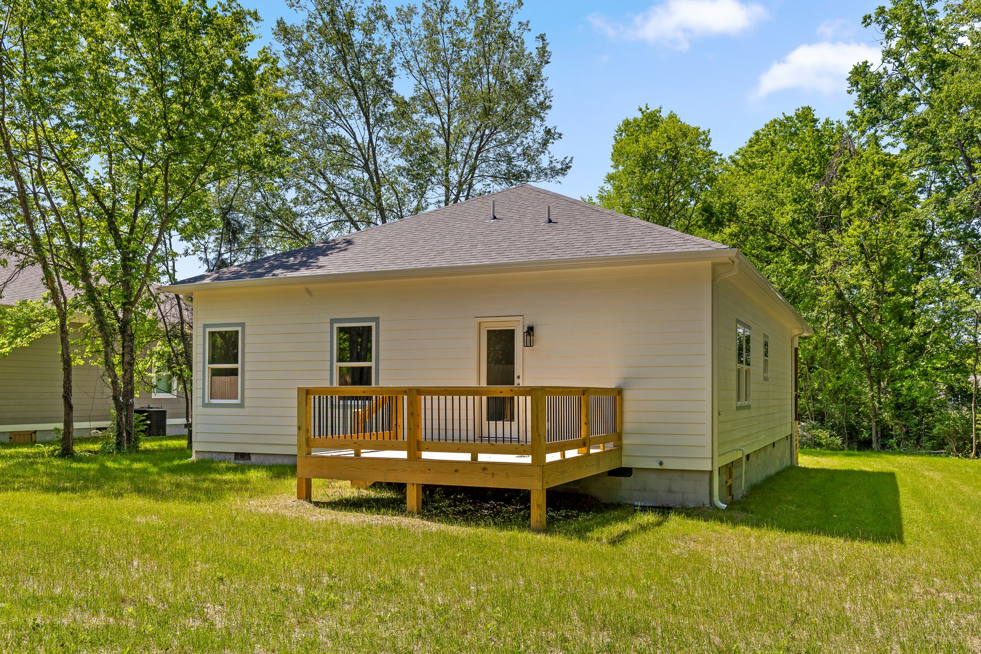 330 12th Ave rear exterior with deck and backyard