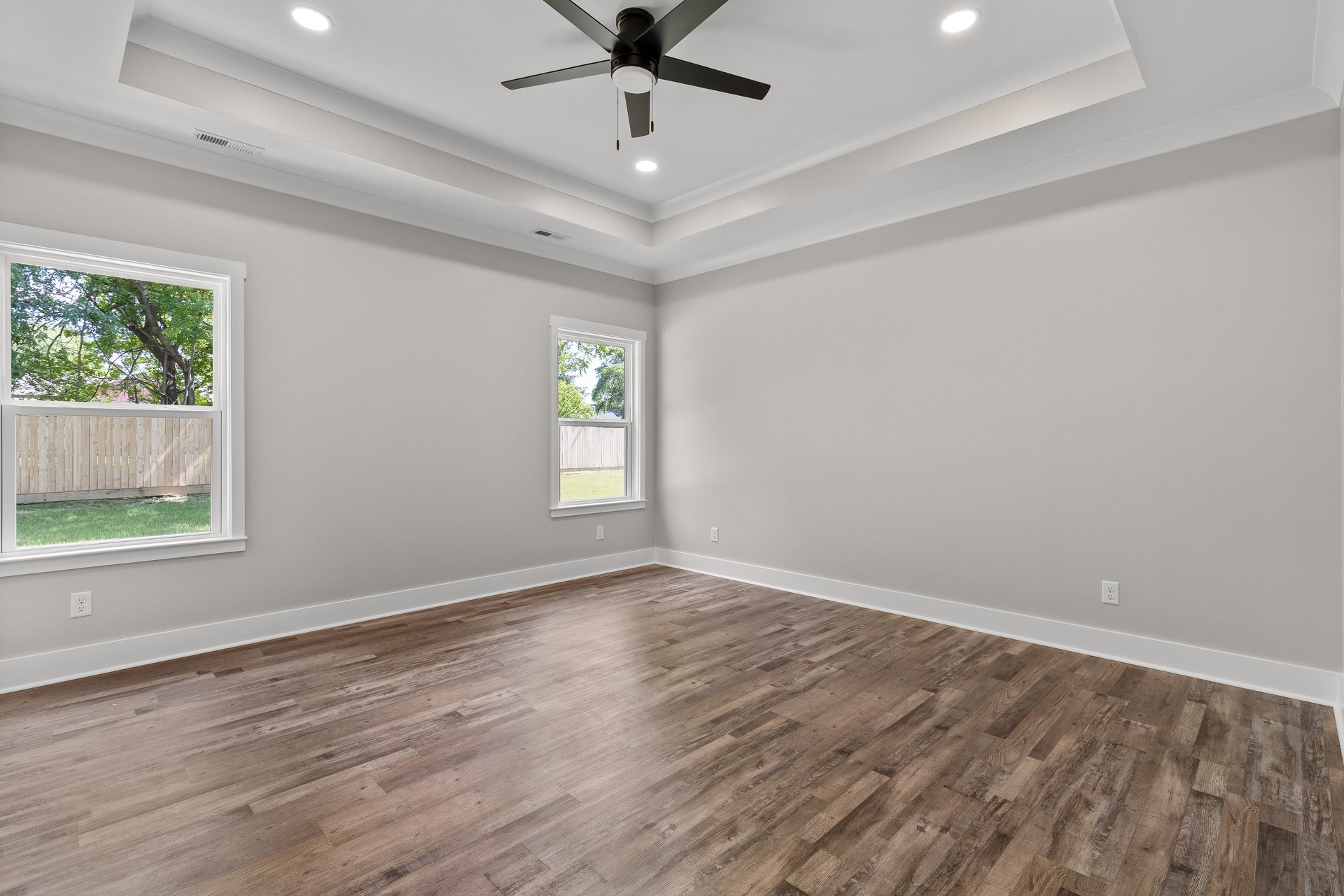 330 12th Ave primary bedroom with a tray ceiling