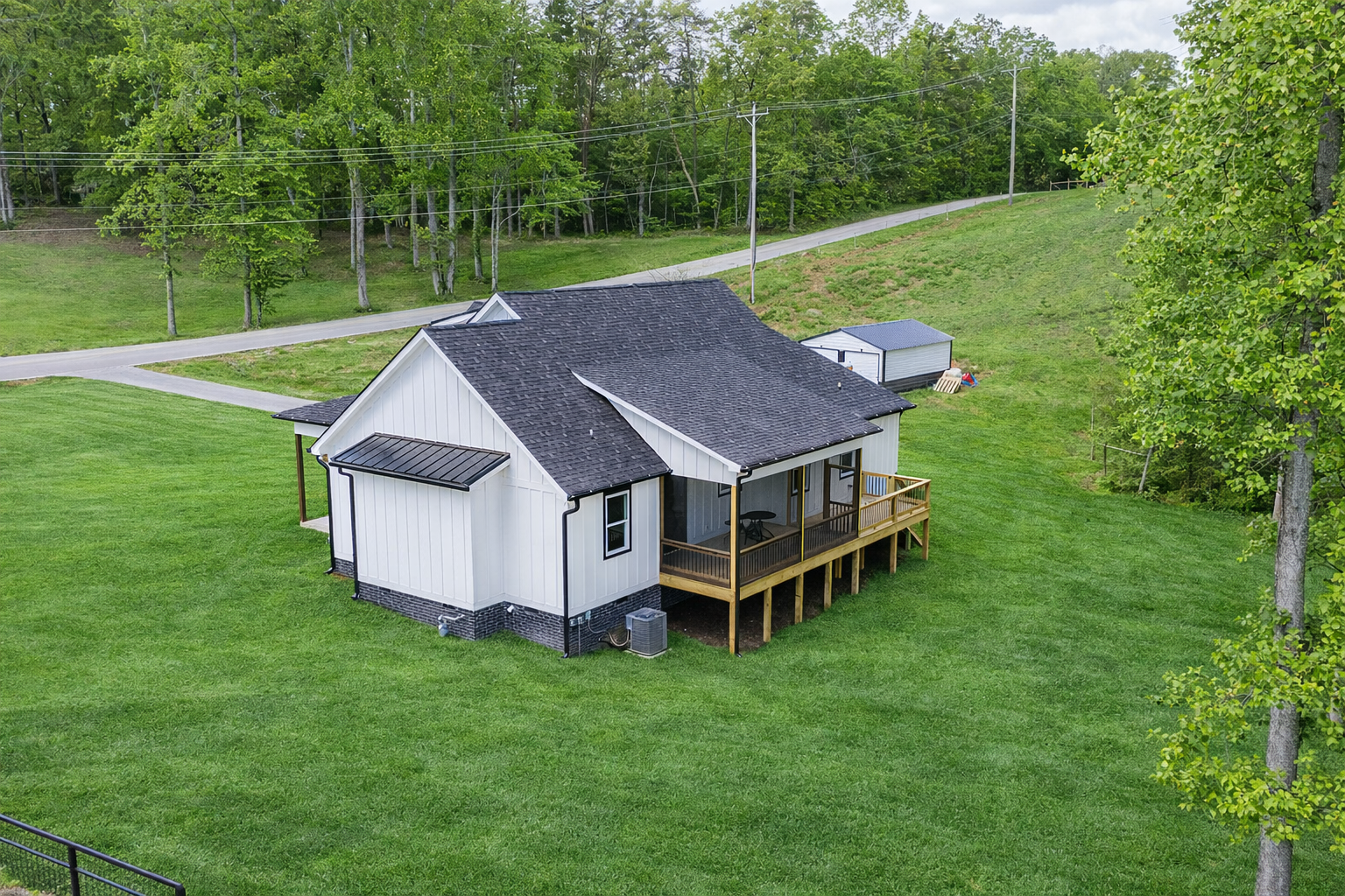 East Highwater rear-corner view with covered back porch