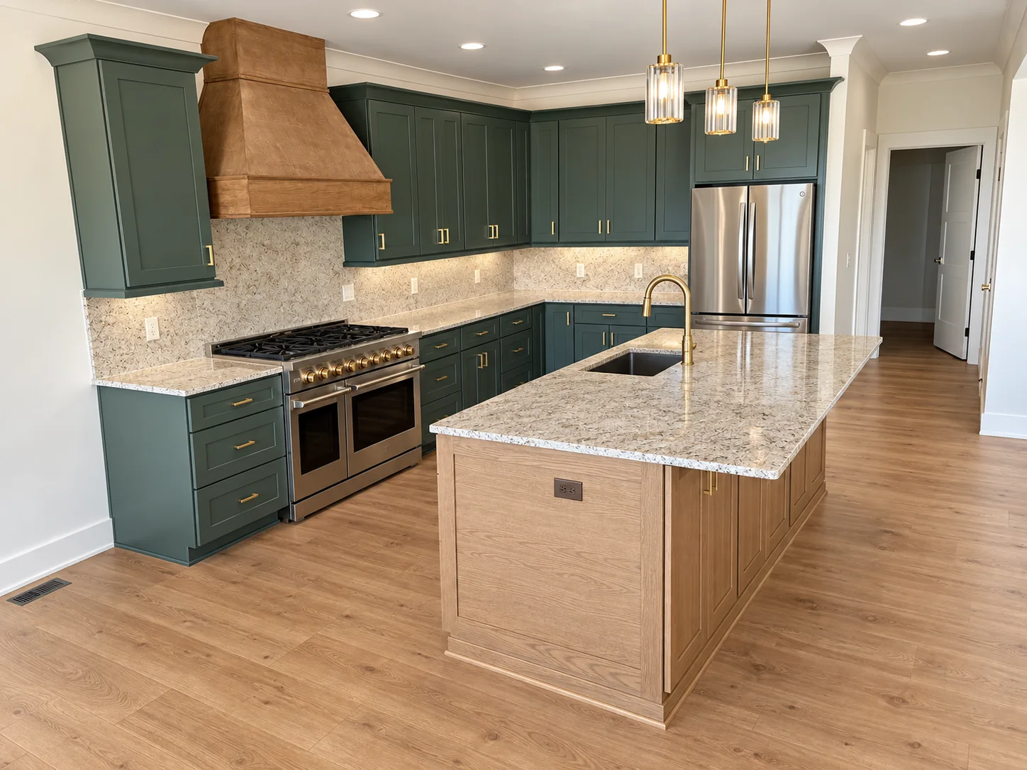 Fox Hill kitchen with green cabinets, a wood range hood, and a granite-topped island