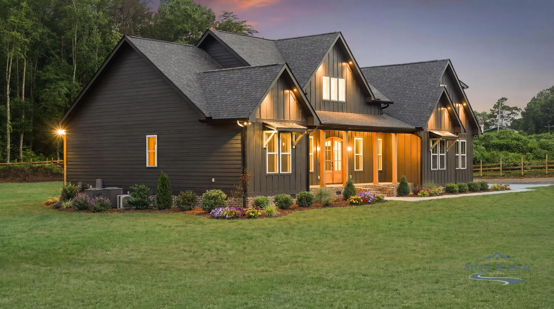Green Pond front exterior at dusk with interior lights on