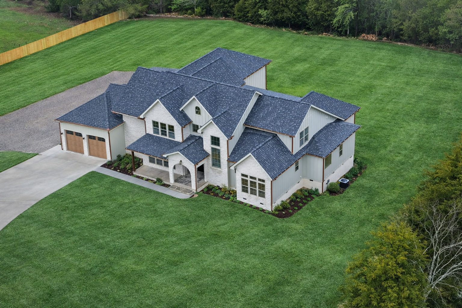 Hixson aerial drone view of the home and lawn