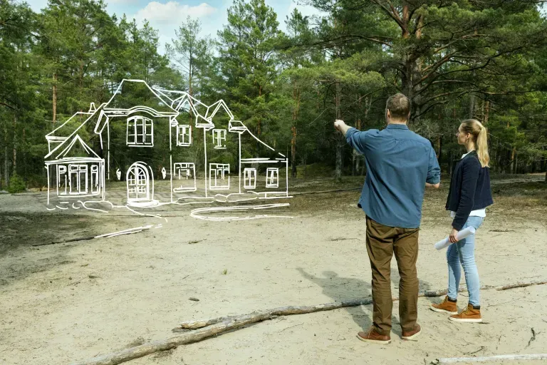 Couple reviewing a homesite rendering