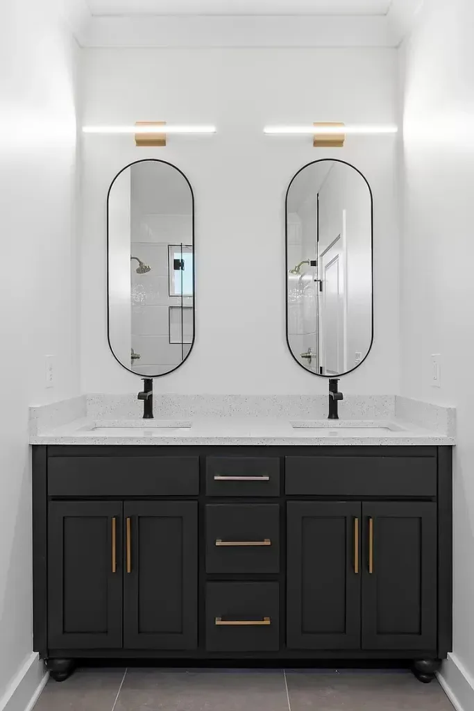 Walk-in shower with frameless glass and tile floor